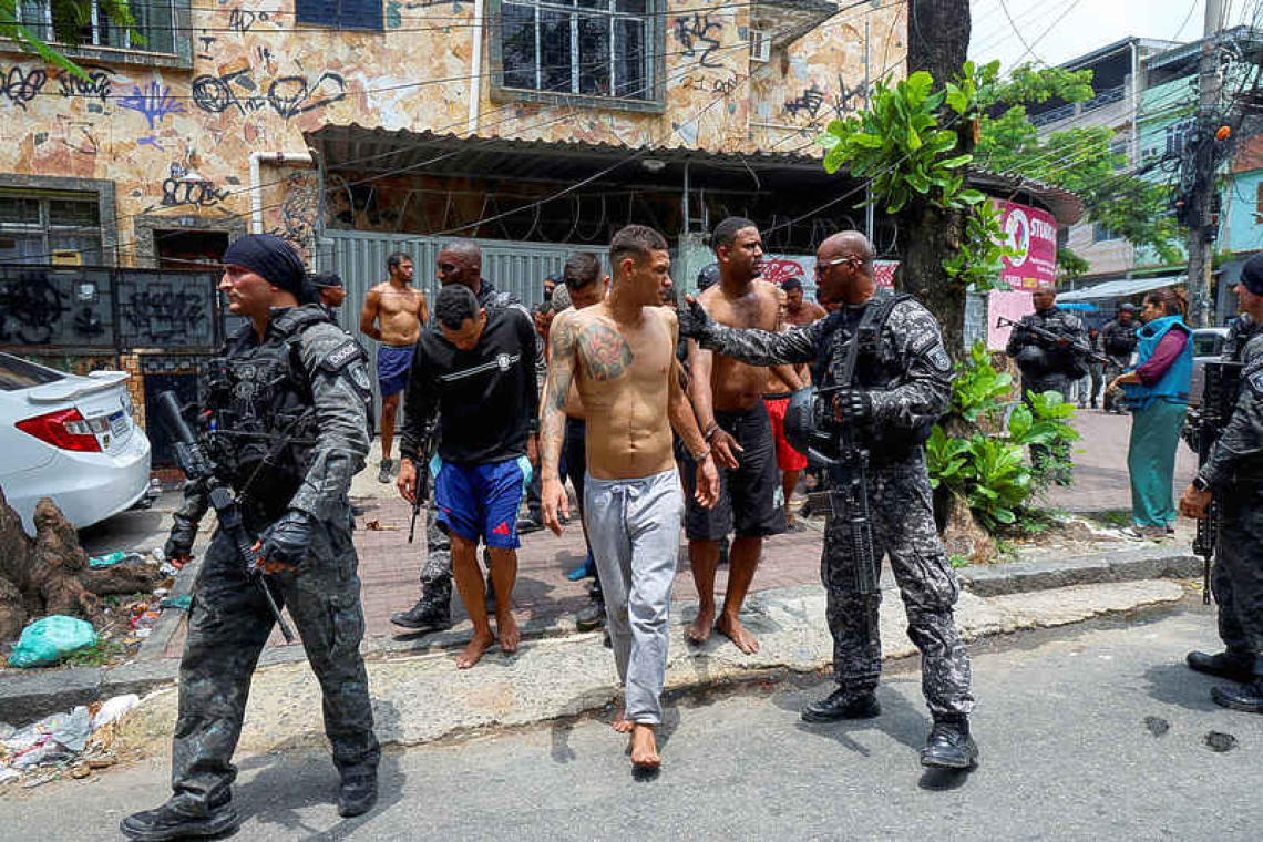 At least 64 killed in Rio police raids  ahead of climate conferences